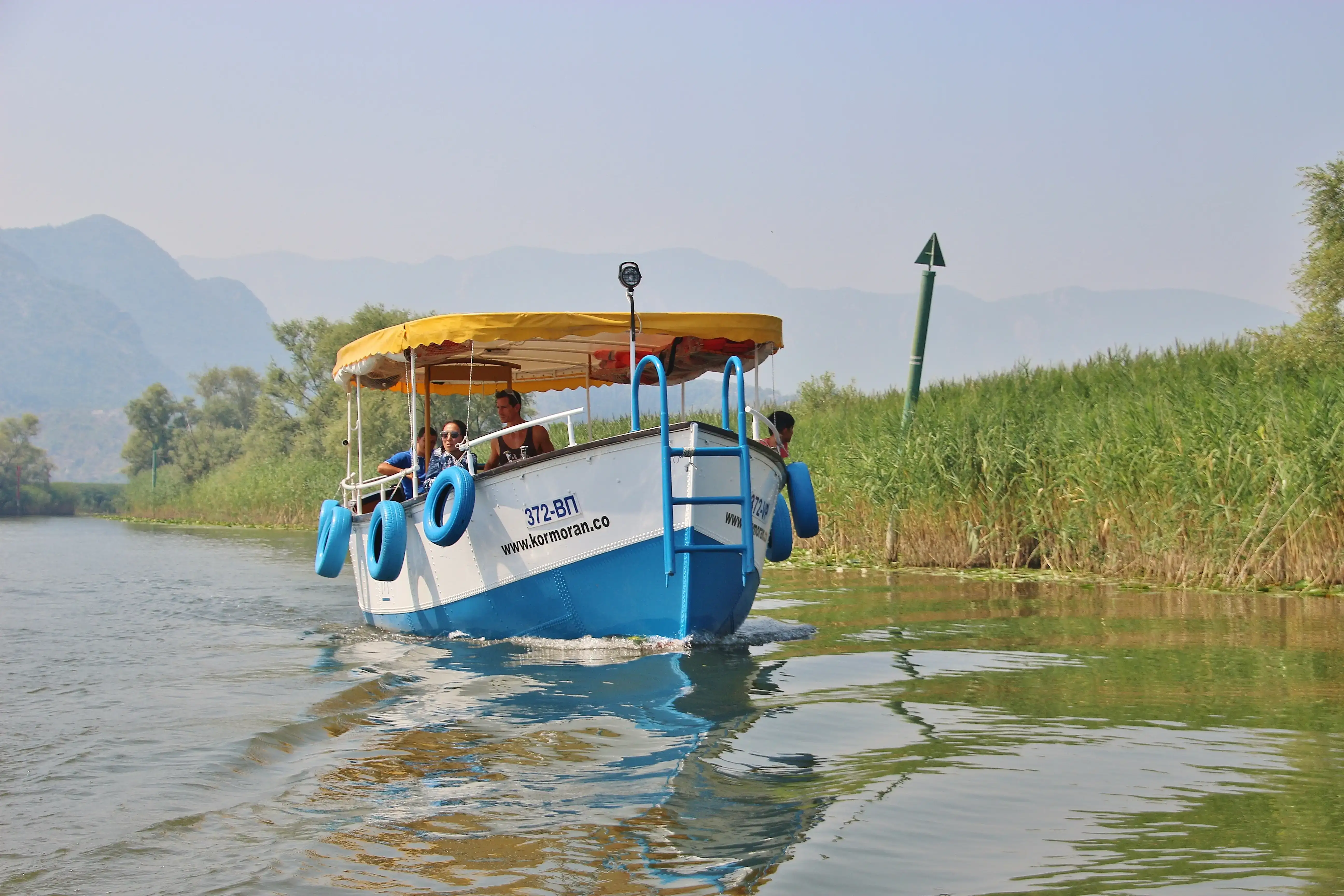 Traditional Montenegrin wooden fishing boat moored at Virpazar dock